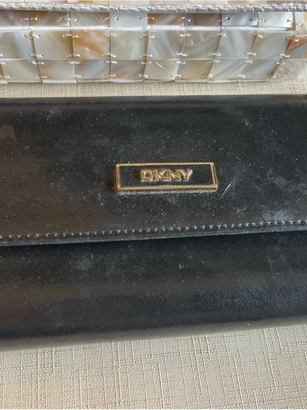 DKNY Black Leather Wallet with Gold Logo Plaque